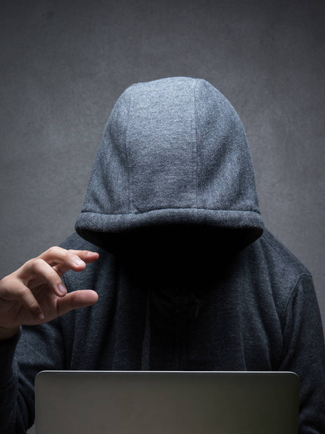 hacker with computer notebook - Фото, зображення