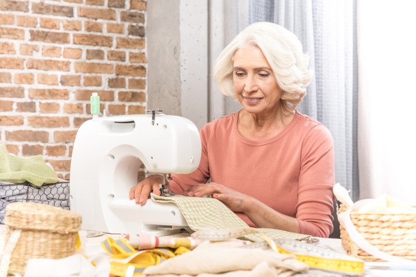 Woman with sewing machine  - Photo, Image