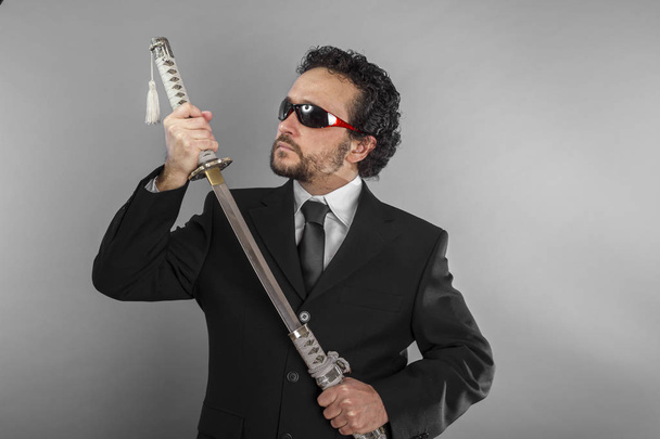 aggressive lawyer with Japanese sword - Photo, Image