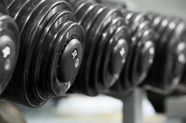 Exercising Dumbbells at gym - Foto, Imagem