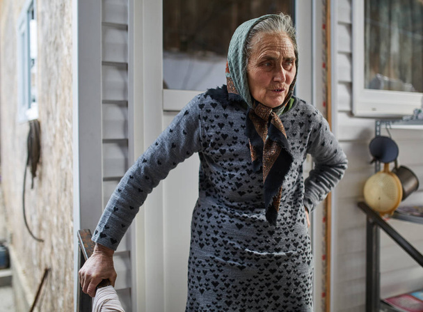 Old farmer woman  - Фото, изображение