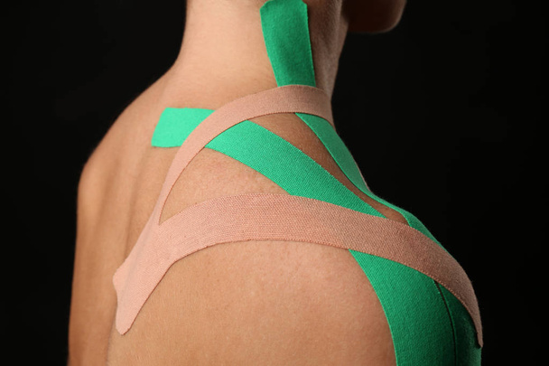 shoulder with physio tape  - Foto, imagen