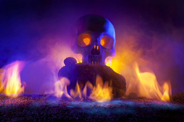 Skull with Burning Flames and Gold Coins - Fotoğraf, Görsel