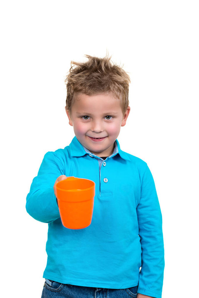 boy drinks from a mug - Фото, зображення