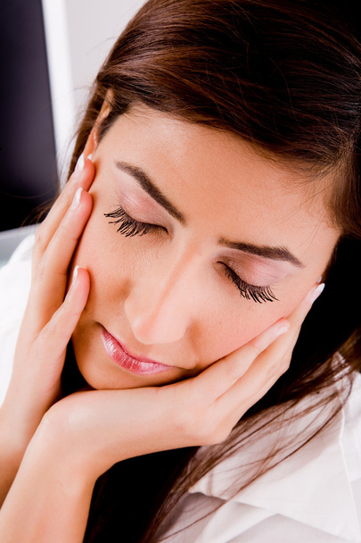 Closeup of tired woman with closed eyes - Фото, зображення