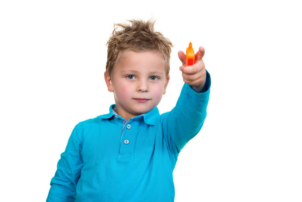 Male child point orange pen - Foto, immagini