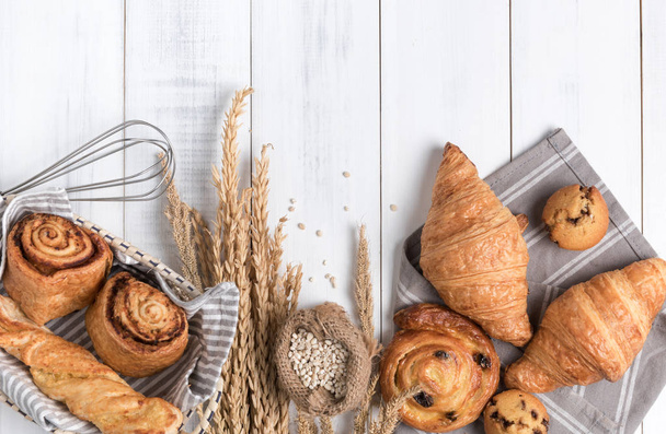 Homemade breads or bun on wood background - Valokuva, kuva