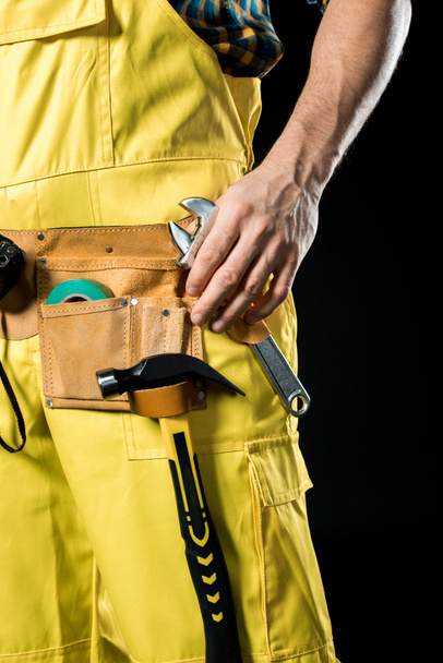 Workman in tool belt  - Foto, imagen