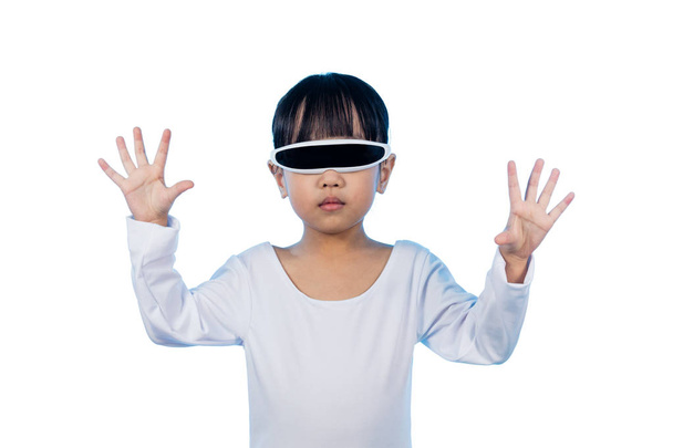 Asian Chinese little girl with futuristic eyeglassses in isolate - Foto, Bild