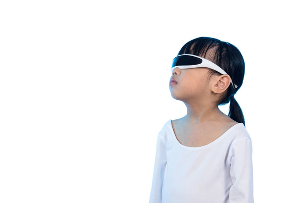 Asian Chinese little girl with futuristic eyeglassses in isolate - 写真・画像