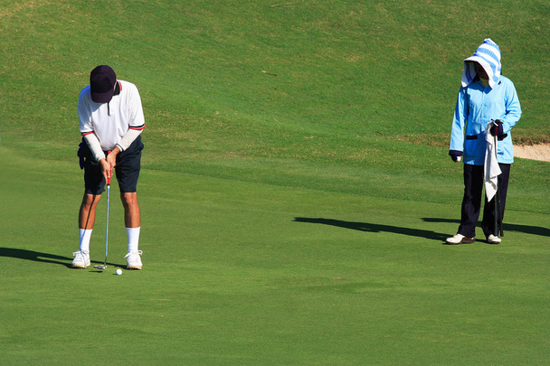 Golfer in action  - Foto, afbeelding