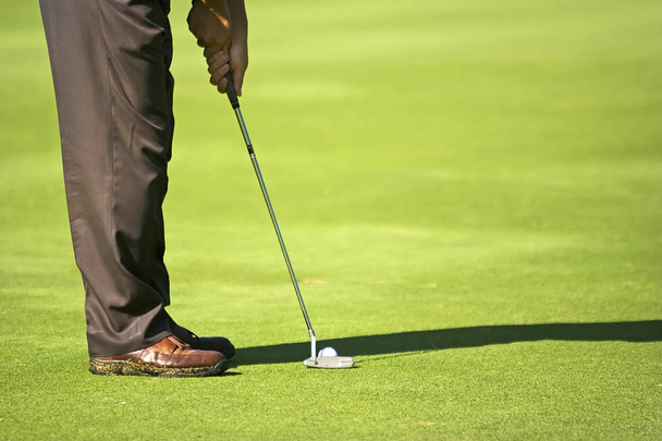Golfer in action - Zdjęcie, obraz