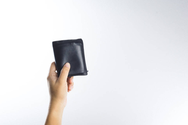 Hand holding old wallet - Foto, imagen
