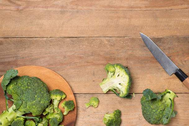 green broccoli on wooden background - Photo, Image