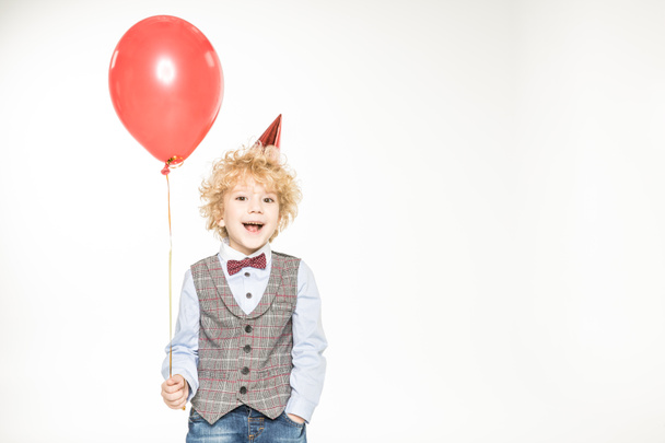 Niño con globo aerostático
 - Foto, Imagen