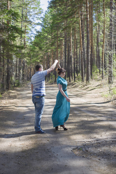 Couple in love walking in the woods. - 写真・画像
