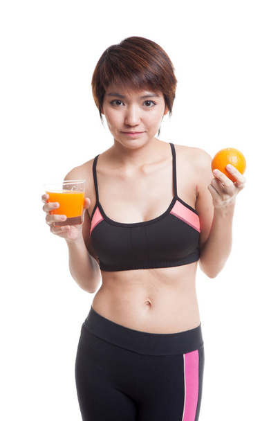 Beautiful Asian healthy girl with orange juice and orange fruit. - Фото, зображення