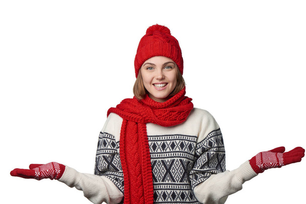 Winter woman holding two opened palms - Фото, изображение