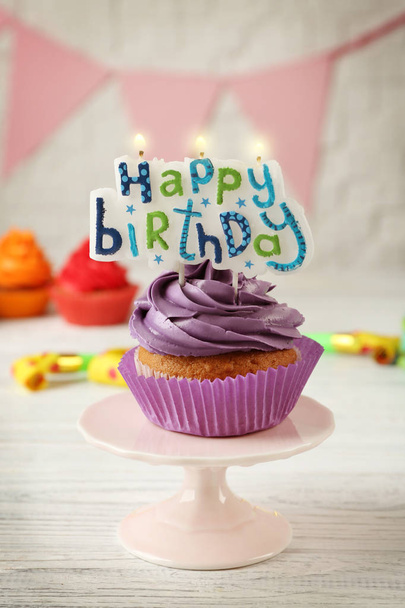 Birthday cupcake with party attributes  - Foto, Imagen