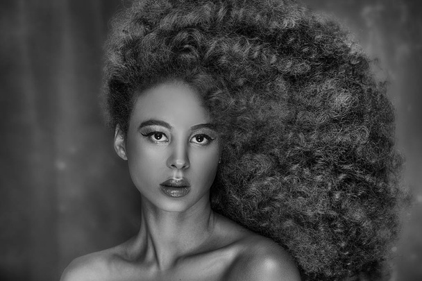 Beauty portrait of girl with afro. - Фото, зображення