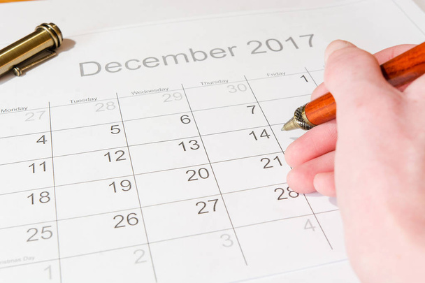 Analysis of a calendar and allocation of date December - Foto, Imagen