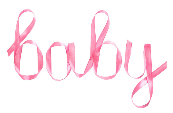 Het woord baby geschreven in roze linten - Foto, afbeelding