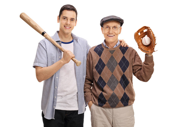 man with a baseball bat and a senior with a glove - 写真・画像