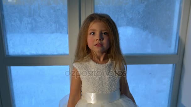 Happy little girl at Christmas tree - Video