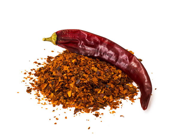 Chili, rode peper vlokken, likdoorns en paprikapoeder - Foto, afbeelding