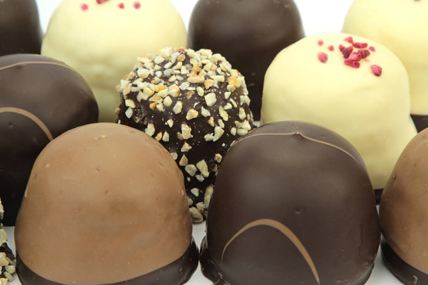 Chocolate coated cream puffs - Foto, imagen