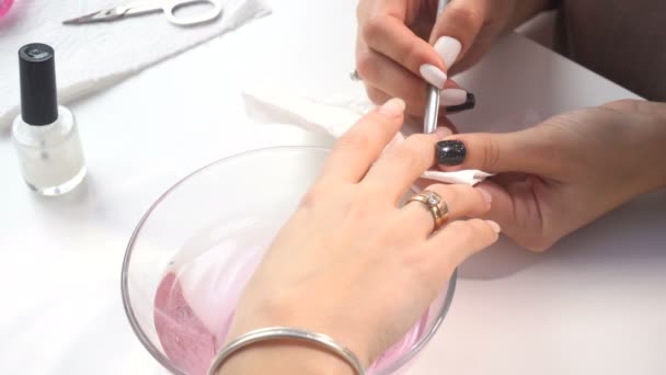 Manicure artist making professional manicure - Footage, Video