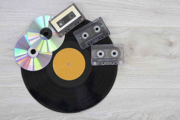 Retro, vinyl record disc, audio cassette and cd - Fotó, kép
