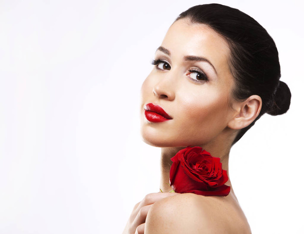 romantic woman holding red rose on white background - Фото, изображение