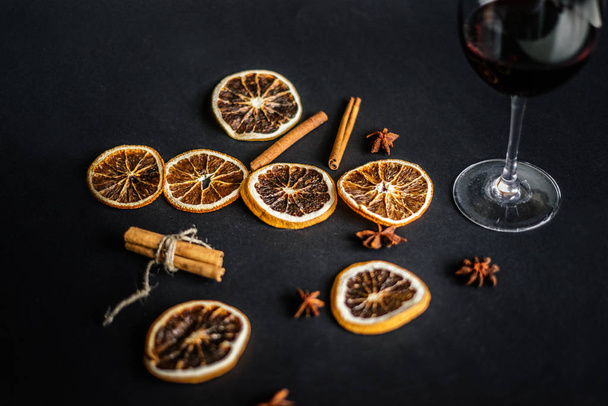 glass of red wine with spices - Photo, Image