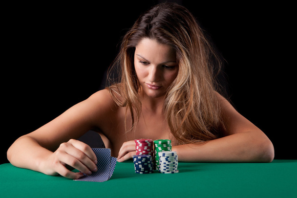 Woman playing poke - Foto, afbeelding