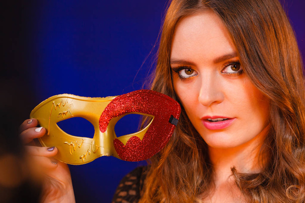 Closeup woman face with carnival mask on dark - Zdjęcie, obraz