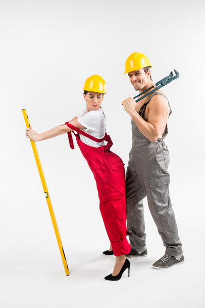 Male and female builders posing - Photo, Image