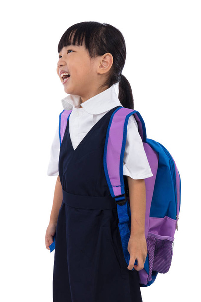 Happy Asian Chinese little girl wearing primary school uniform - Photo, image