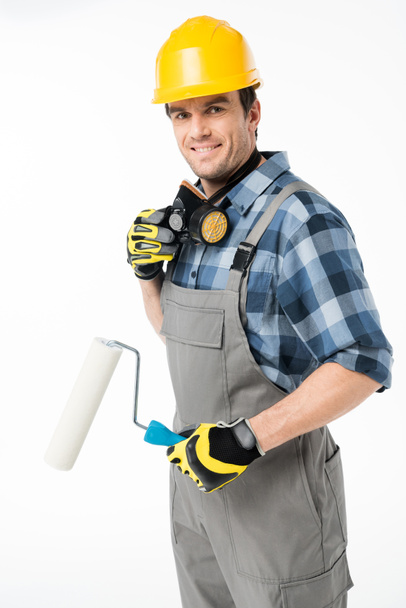 Workman with paint roller    - Photo, Image
