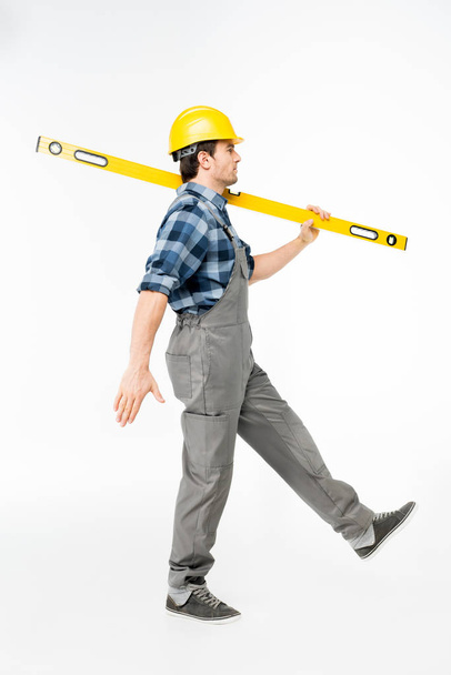 Workman with level tool - Foto, Imagem