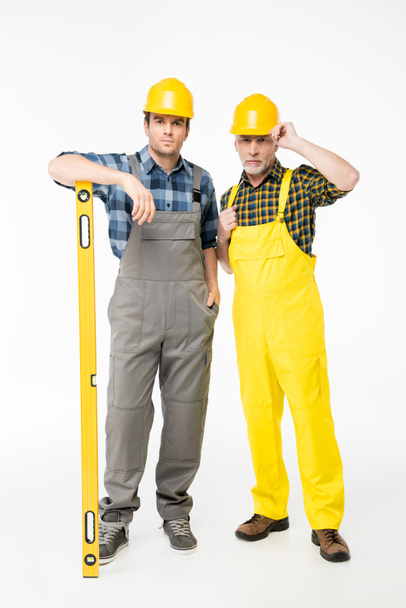 Workmen with level tool - Photo, Image