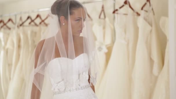 Women in wedding dresses in bridal boutique - Footage, Video