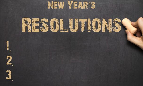 palabra resolución de Año Nuevo escrito en la pizarra
 - Foto, Imagen
