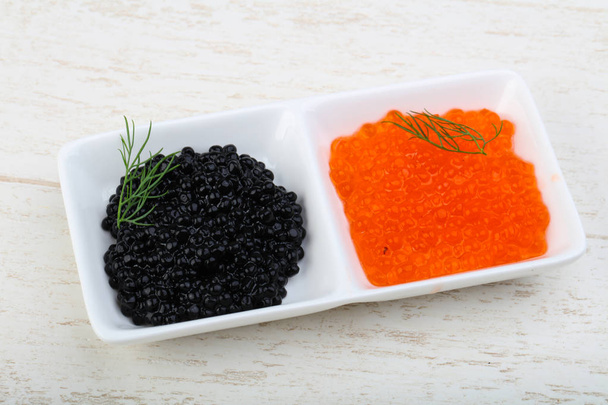 Delicioso caviar negro y rojo
 - Foto, Imagen
