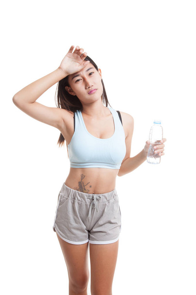 Beautiful Asian healthy girl with bottle of drinking water. - Photo, Image