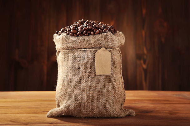 Coffee beans in sackcloth - Photo, image