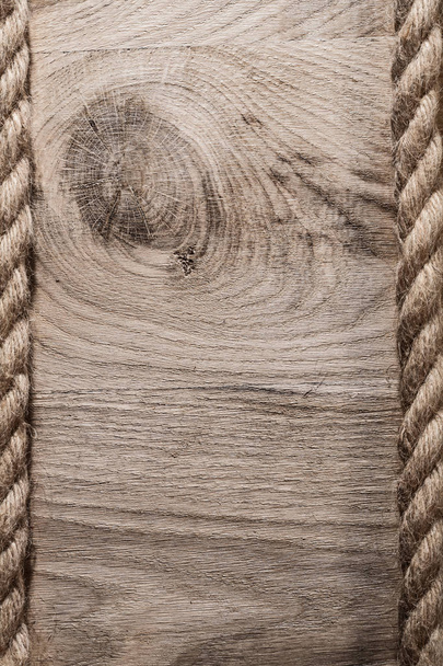 Vintage hemp cables on wooden board vertical version - Φωτογραφία, εικόνα