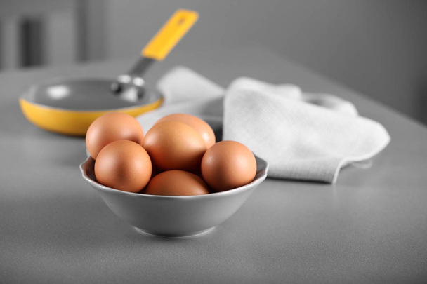 Raw eggs in bowl  - Fotó, kép