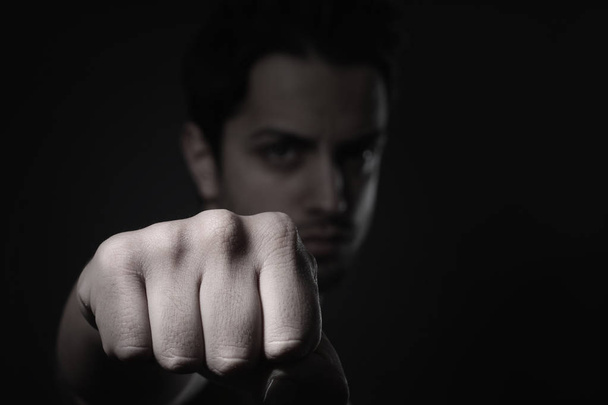 Aggressive man punching - Zdjęcie, obraz
