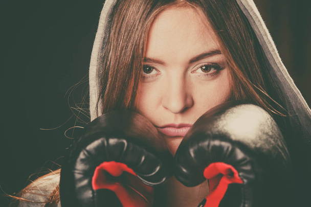 Woman cover face with boxing gloves. - Φωτογραφία, εικόνα